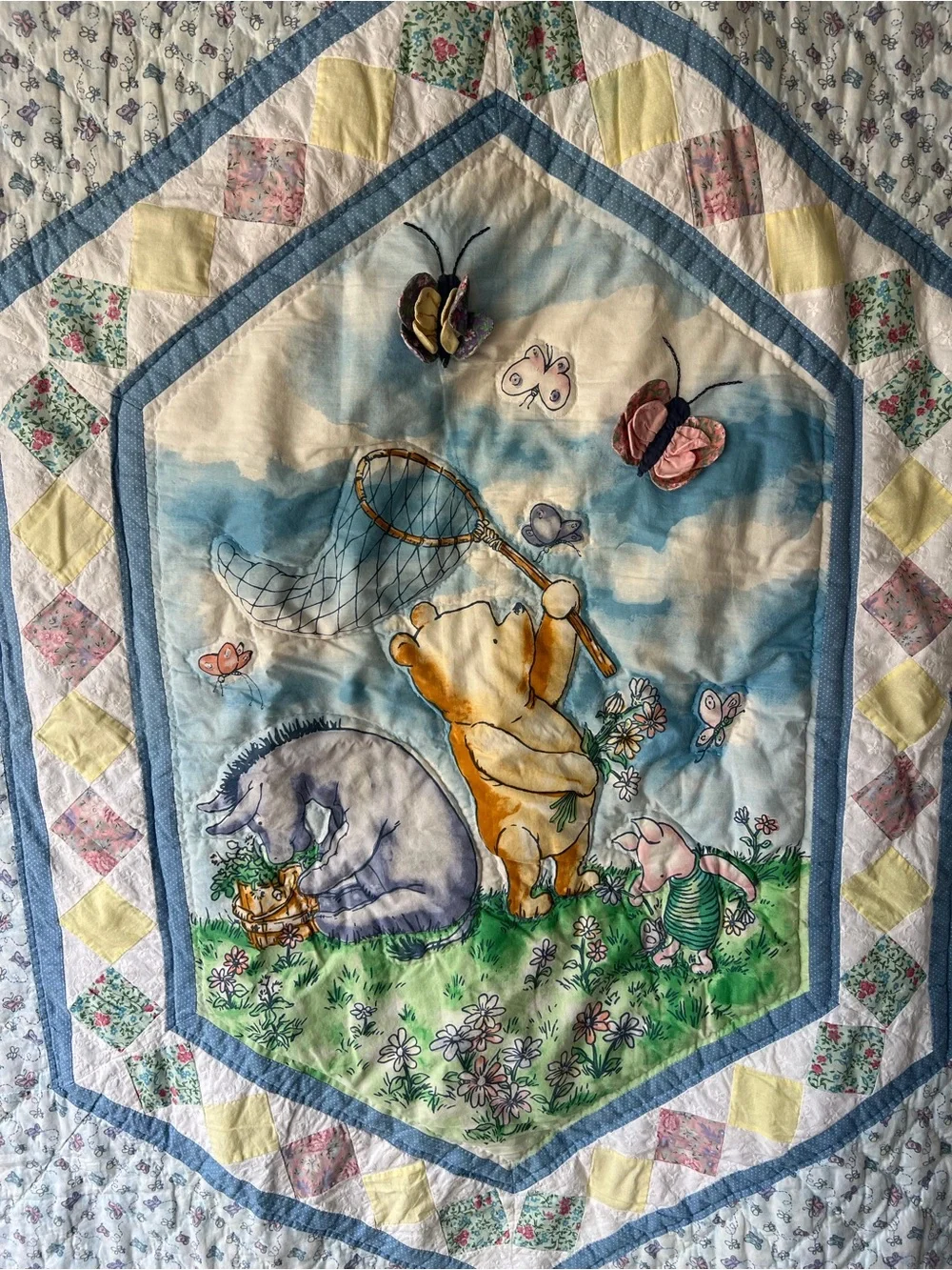 Classic style Winnie-the-Pooh Baby Quilt in Pastel Blue and Yellow